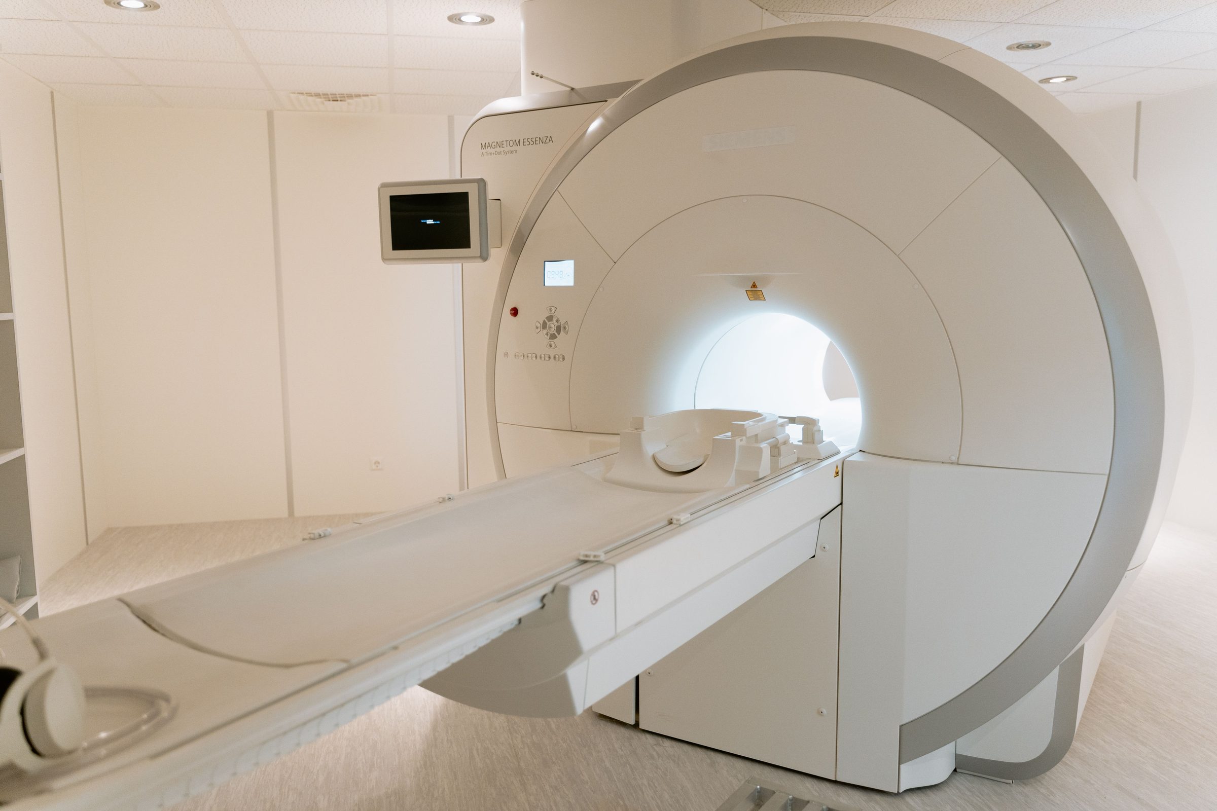 An MRI scanner in a quiet, modern imaging suite
